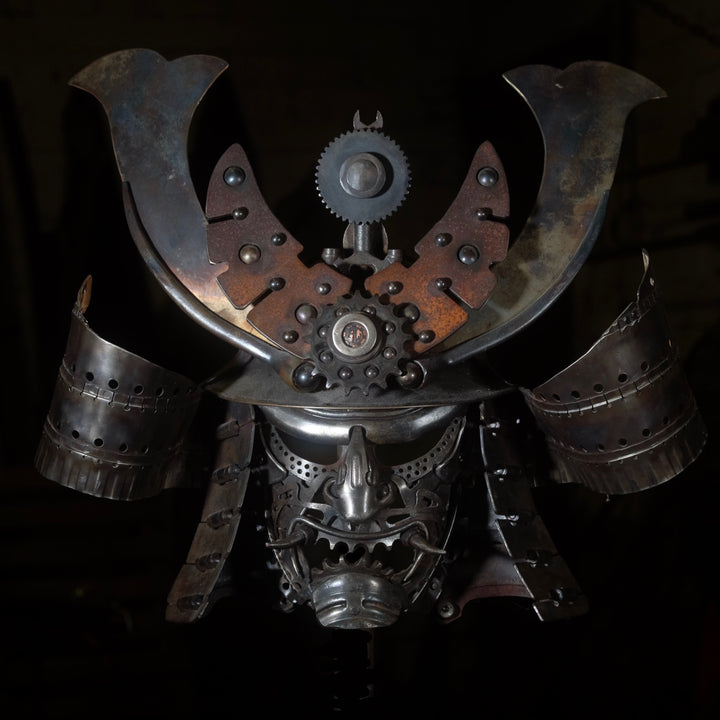 Samurai-inspired helmet sculpture crafted from reclaimed metal with intricate steampunk detailing.
