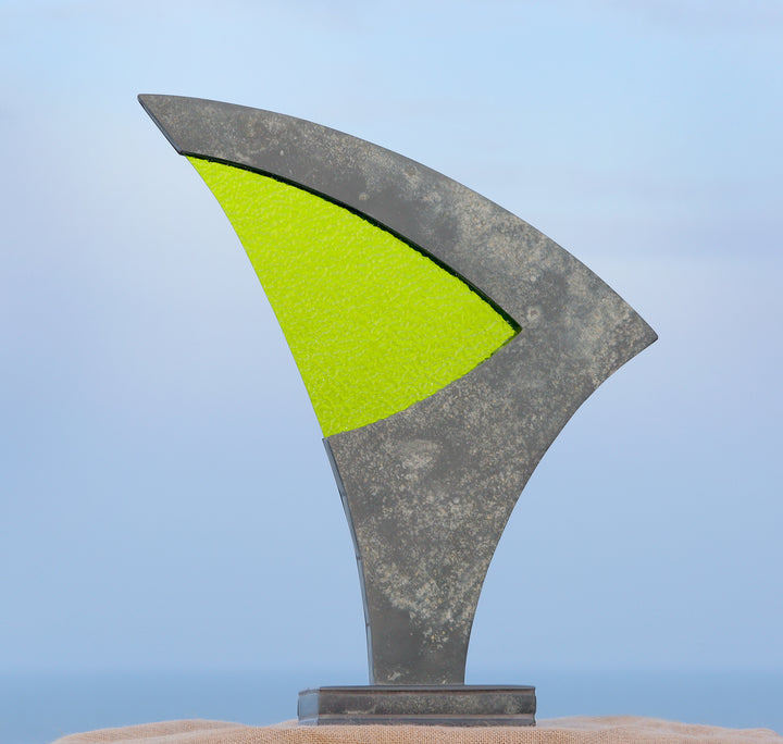 Stacey Beaumont Sanctuary slate and glass sculpture, abstract form in reclaimed Delabole slate with lime green textured glass symbolising renewal and vitality.