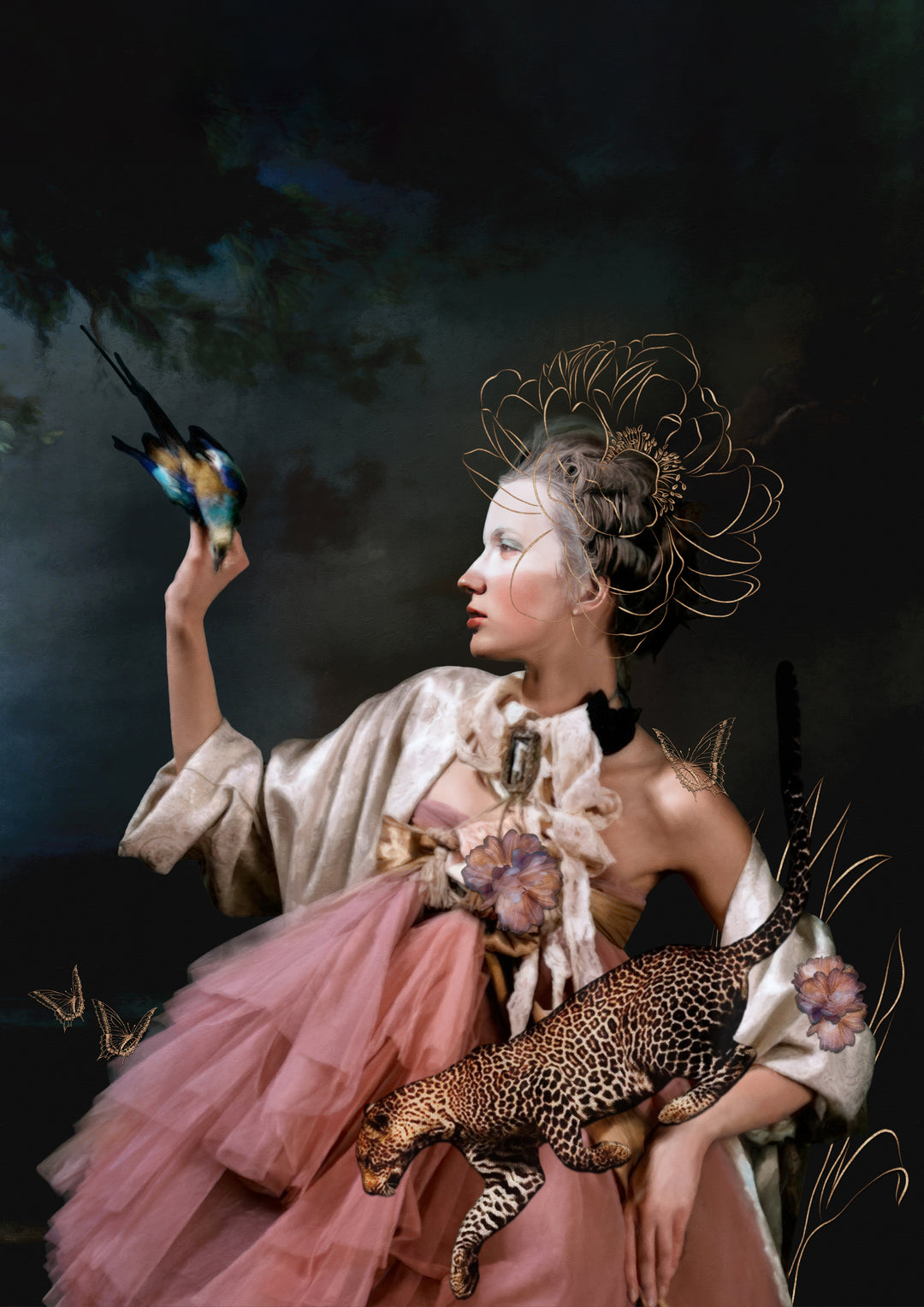 Catarina Diaz’s Set You Free, analogue collage on Somerset Enhanced Velvet with oil on canvas. Rococo-inspired woman in pink gown and ivory robe holds leopard, raises hand to blue-and-gold bird, framed by butterflies and flowers against deep dark backdrop.