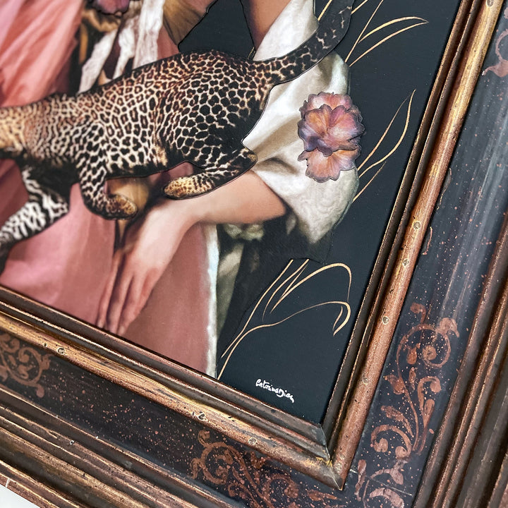 Catarina Diaz’s Set You Free, analogue collage on Somerset Enhanced Velvet with oil on canvas. Rococo-inspired woman in pink gown and ivory robe holds leopard, raises hand to blue-and-gold bird, framed by butterflies and flowers against deep dark backdrop.