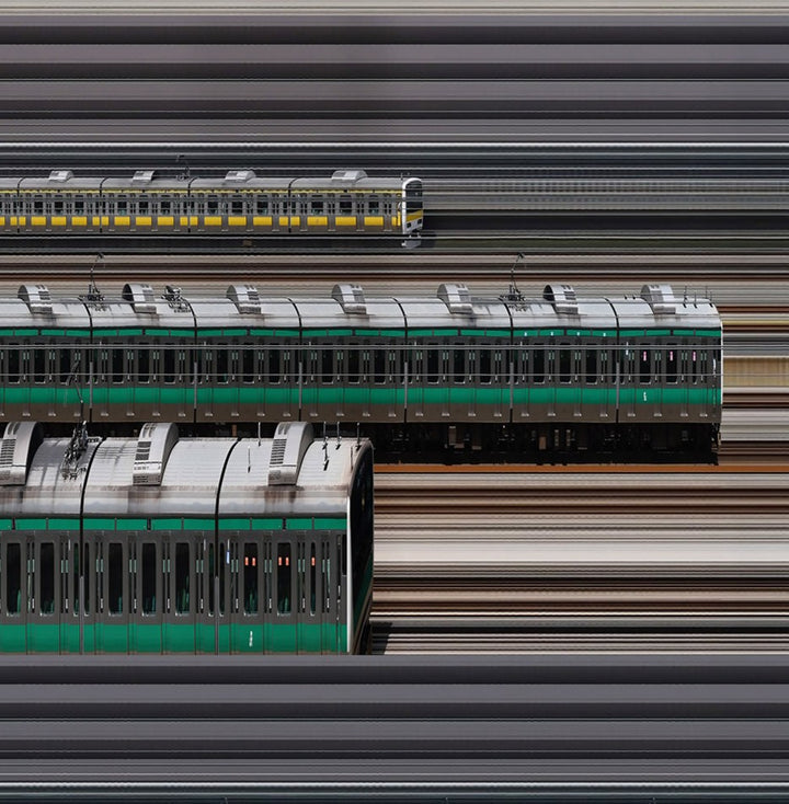 Richard P Jones Shinjuku Station #4 fine art photographic print showing layered Japanese commuter trains moving through Tokyo rail lines, created from reconstructed high-speed video imagery and printed as a giclée on brushed aluminium.