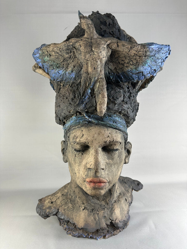 Limited edition ceramic sculpture Sleeping Gods II by Eve Shepherd, depicting a monumental hand-built head with closed eyes and a textured, symbolic crown, sculpted in earthy stone-grey tones with blue and mineral patina details, evoking myth, memory, and quiet power.