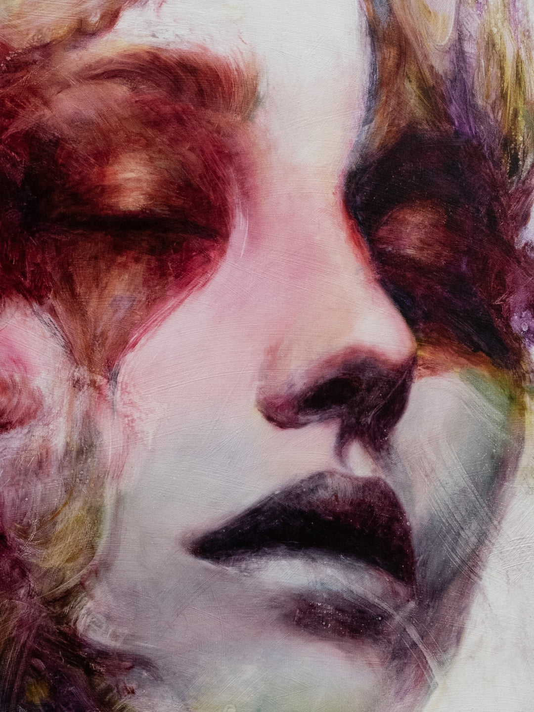 Large oil on canvas portrait by Dan Bullock, titled Spectrum. A dreamlike female face with eyes closed, surrounded by expressive swirls of crimson, violet, emerald, gold, and deep shadow tones, blending realism with abstraction.