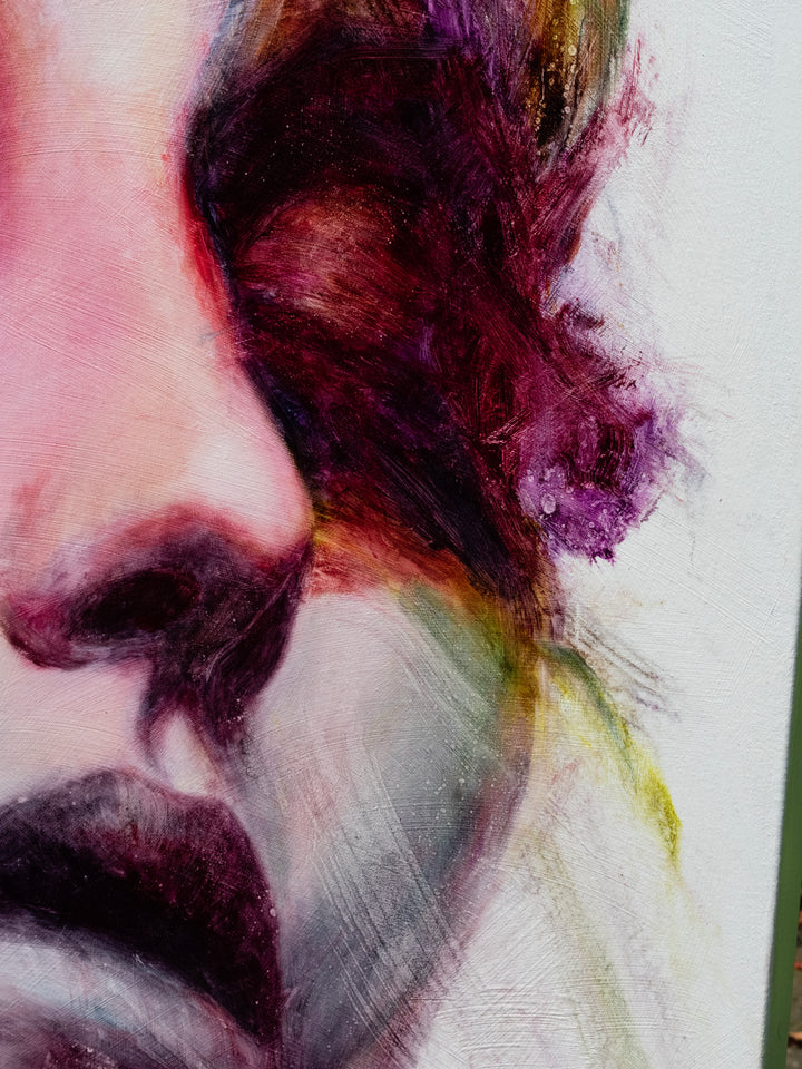 Large oil on canvas portrait by Dan Bullock, titled Spectrum. A dreamlike female face with eyes closed, surrounded by expressive swirls of crimson, violet, emerald, gold, and deep shadow tones, blending realism with abstraction.