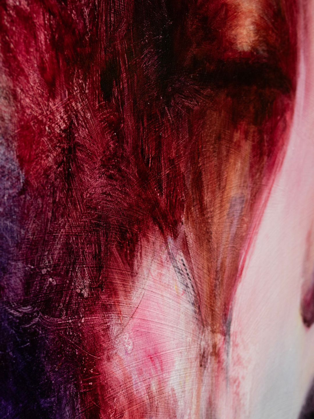 Large oil on canvas portrait by Dan Bullock, titled Spectrum. A dreamlike female face with eyes closed, surrounded by expressive swirls of crimson, violet, emerald, gold, and deep shadow tones, blending realism with abstraction.
