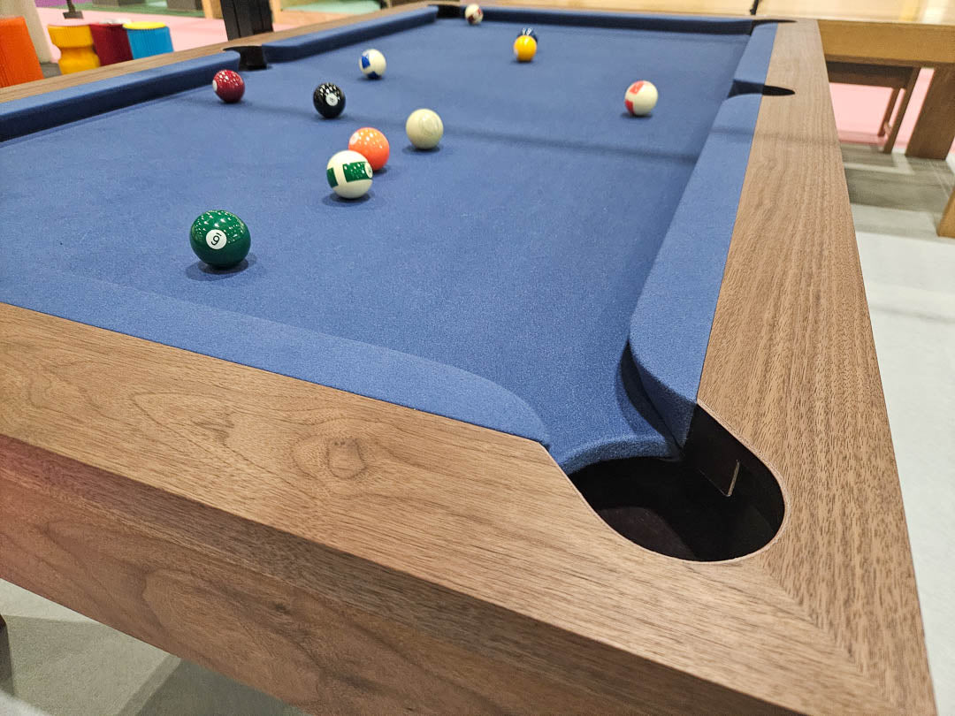 Sir William Bentley Billiards Speed 7ft pool table in American black walnut with slate cloth, shown with optional dining top for dual-purpose use.
