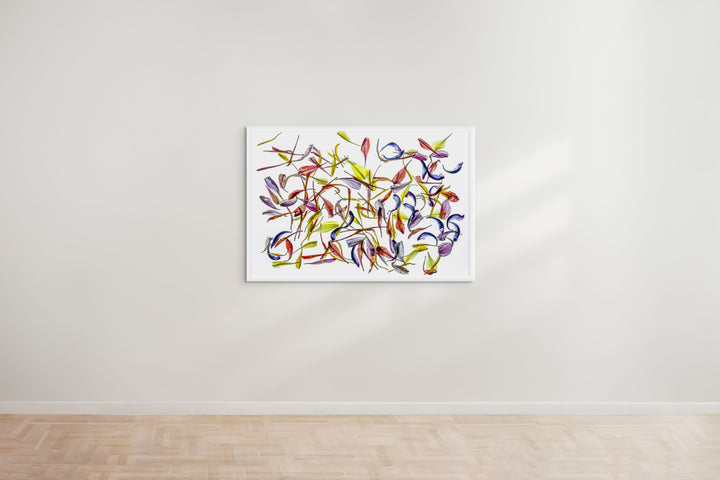 A vibrant composition of multicoloured flower petals arranged on a white canvas backdrop. The translucent petals display a variety of hues and textures, scattered in an expressive and organic pattern, showcasing tones of red, yellow, blue, purple, and orange against the stark, clean background.