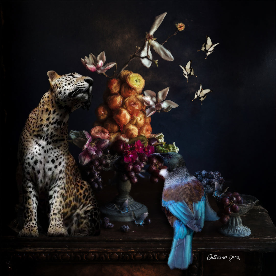 Catarina Diaz’s Stillness, analogue collage on Somerset Enhanced Velvet with oil on black gesso-primed canvas. A leopard sits beside an ornate still life of flowers and fruit, joined by a blue and brown bird and butterflies, all framed in an antique gold gallery frame.