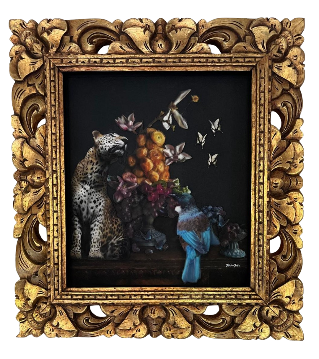 Catarina Diaz’s Stillness, analogue collage on Somerset Enhanced Velvet with oil on black gesso-primed canvas. A leopard sits beside an ornate still life of flowers and fruit, joined by a blue and brown bird and butterflies, all framed in an antique gold gallery frame.