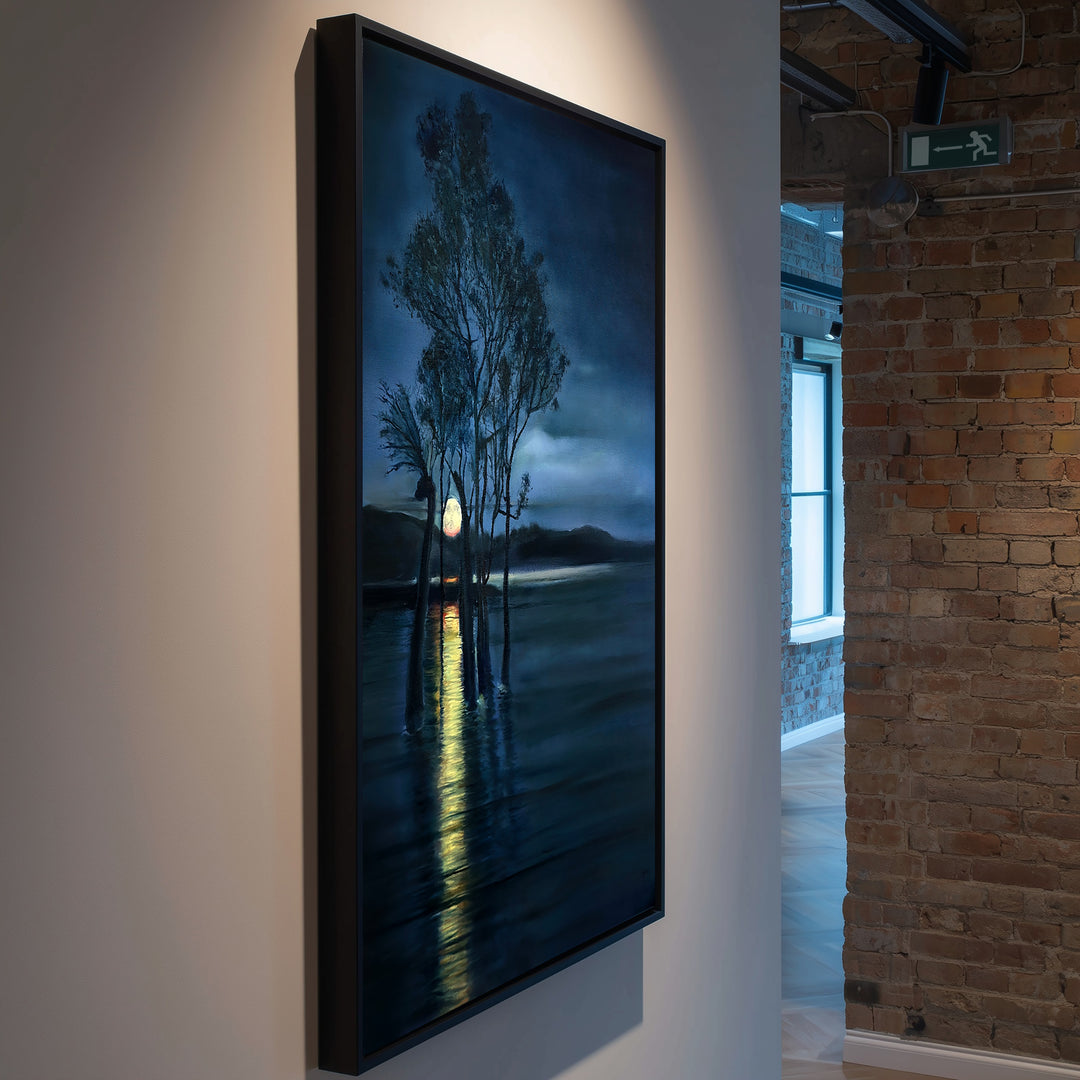 Moonrise by Ewan Story – oil on canvas painting of silhouetted trees rising from still water beneath a deep indigo night sky, a golden moon reflecting across dark blue tones, atmospheric contemporary landscape wall art from The Collection.