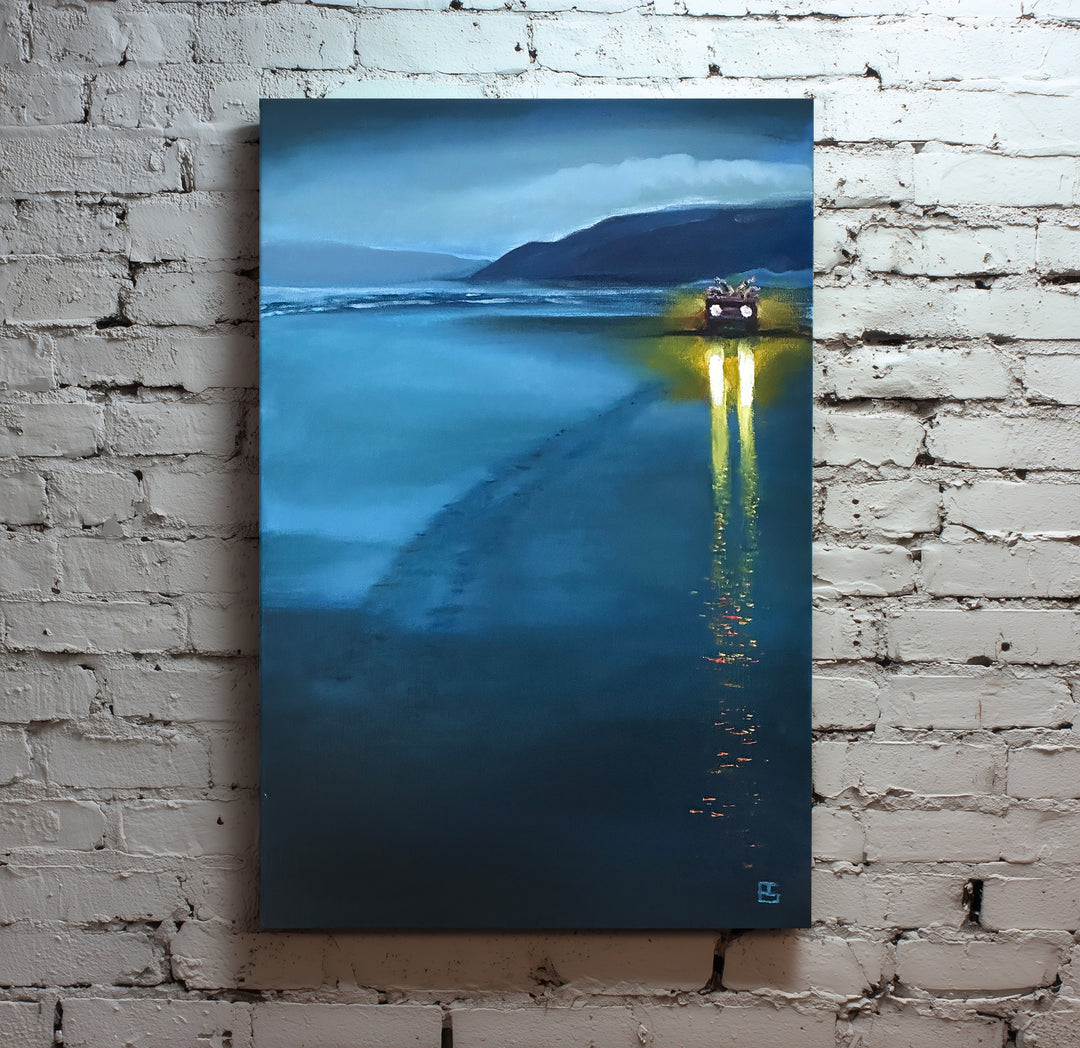 Newgale by Ewan Story – oil on canvas painting of an RNLI quad bike on a vast blue tidal beach at dusk, bright yellow headlights reflecting across wet sand beneath misty coastal headlands, contemporary British wall art from The Collection.