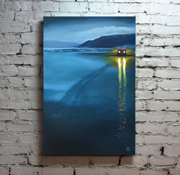 Newgale by Ewan Story – oil on canvas painting of an RNLI quad bike on a vast blue tidal beach at dusk, bright yellow headlights reflecting across wet sand beneath misty coastal headlands, contemporary British wall art from The Collection.