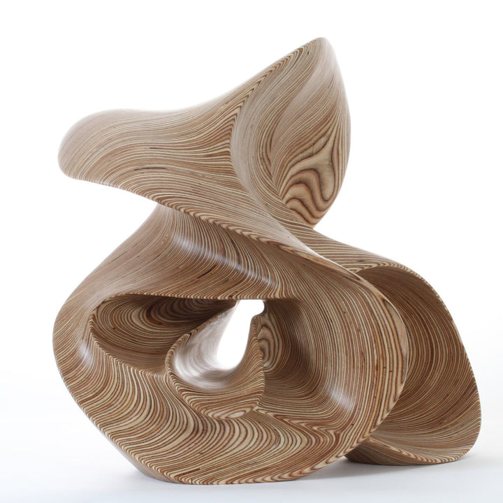 Hand-carved birch plywood abstract sculpture with flowing, mathematical forms inspired by chaotic systems and the Halvorsen Attractor.