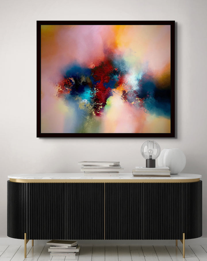 Summer Spirit by Simon Kenny — a vibrant abstract oil painting blending warm pinks, rich reds, deep blues, golden yellows, and soft turquoise in a radiant, atmospheric composition evoking the energy and glow of a summer evening.