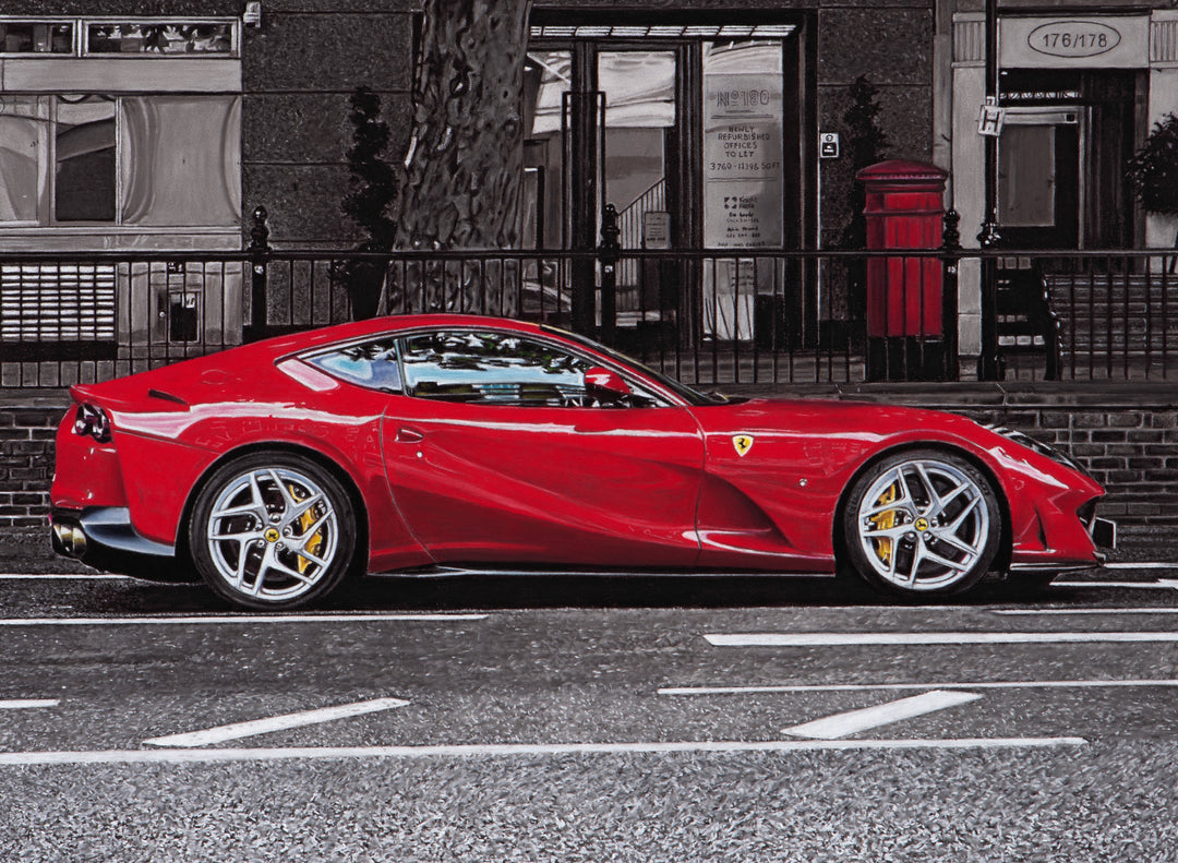 Limited edition giclée print by Ray West featuring a hyper-realistic pastel artwork of a red Ferrari 812 Superfast parked on a London street in Knightsbridge, with bold colour contrast against a muted urban background, reproduced on archival quality fine art paper.