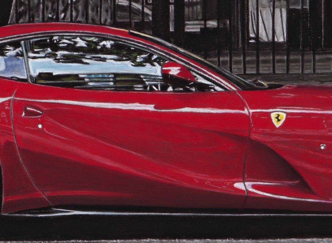 Limited edition giclée print by Ray West featuring a hyper-realistic pastel artwork of a red Ferrari 812 Superfast parked on a London street in Knightsbridge, with bold colour contrast against a muted urban background, reproduced on archival quality fine art paper.