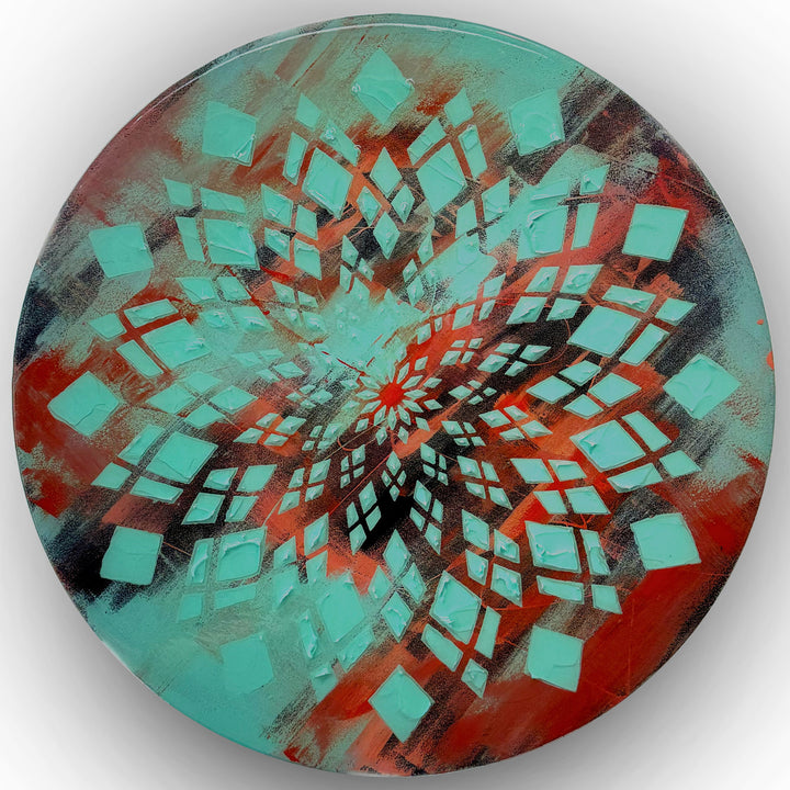 Contemporary circular wall artwork by Mike Philp built from layered teal geometric forms radiating outward against warmer undertones. The high-gloss resin surface amplifies movement, depth, and visual flow.