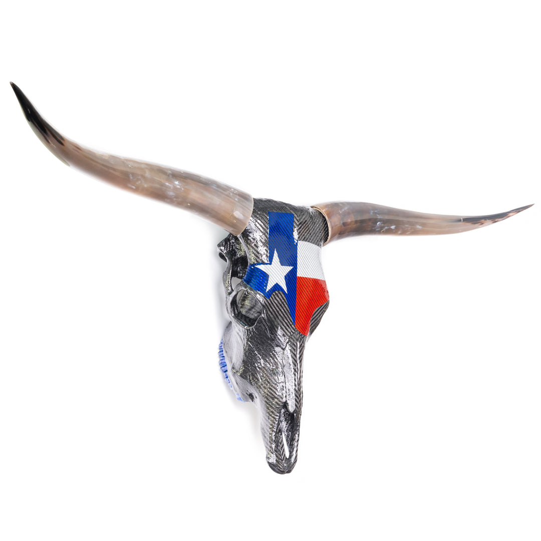 Alastair Gibson CarbonArt45 Texas Longhorn skull sculpture in carbon fibre with Texalium Texas flag detail, polished natural horns and titanium Formula One components