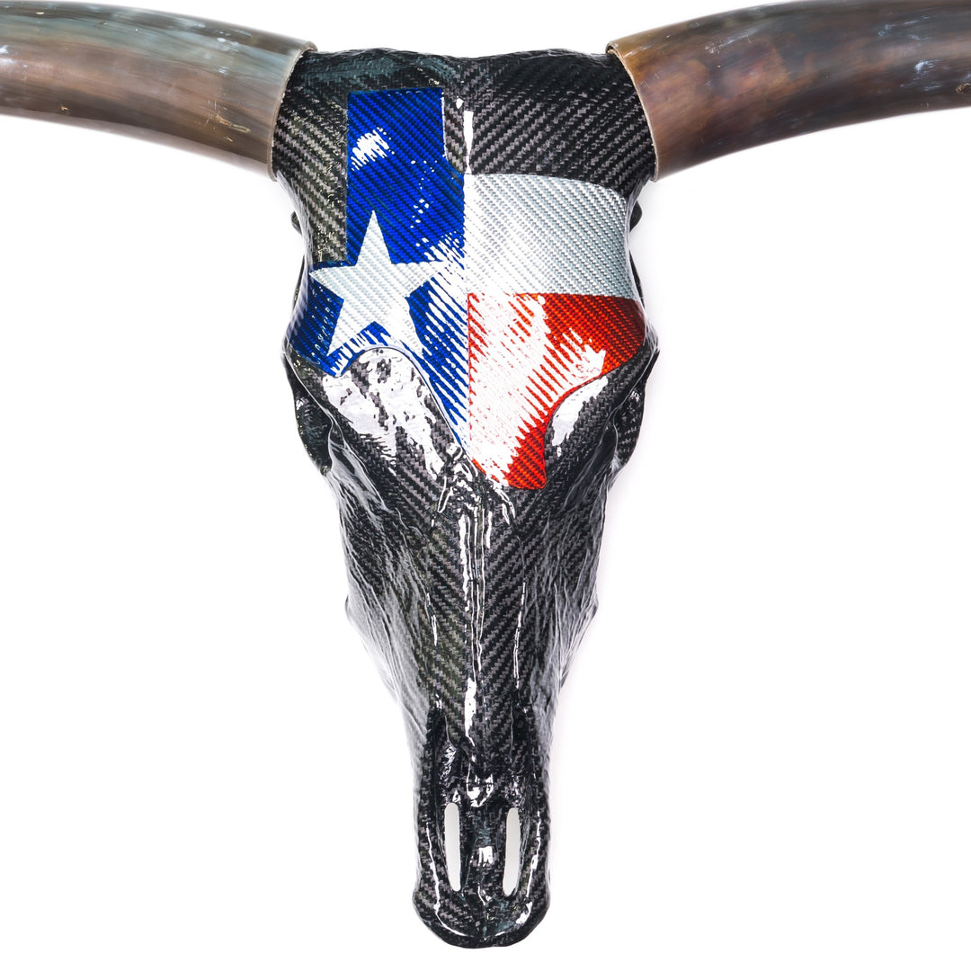 Alastair Gibson CarbonArt45 Texas Longhorn skull sculpture in carbon fibre with Texalium Texas flag detail, polished natural horns and titanium Formula One components