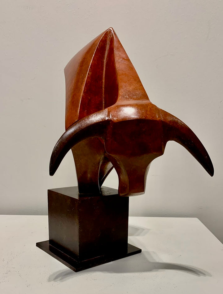 Marie Ackers The Bull’s Head bronze sculpture — stylised abstract bull head with powerful downward stance, geometric lines and deep red patina. Signed, numbered, and foundry stamped with certificate of authenticity.