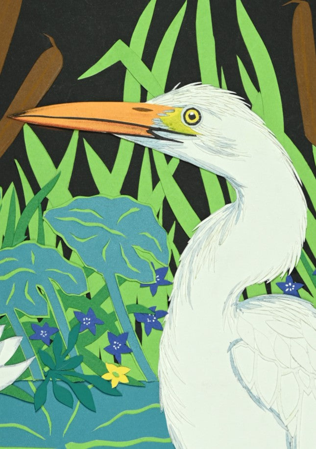 Cut-paper artwork depicting a white egret standing among waterlilies, reeds and lily pads, with bright green foliage, yellow blossoms and a detailed dragonfly, all composed from layered coloured papers.