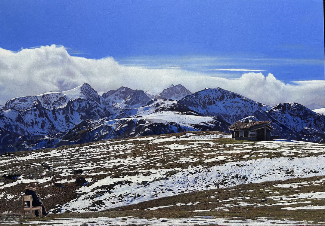 James Earley The Magic Door realism Print depicting a young boy seated alone on a chair overlooking a vast Pyrenean mountain landscape, with snow-covered peaks stretching beneath a deep blue sky. The composition balances solitude and openness, with the small figure placed against an expansive horizon, evoking quiet reflection, emotional release and a sense of escape into nature.