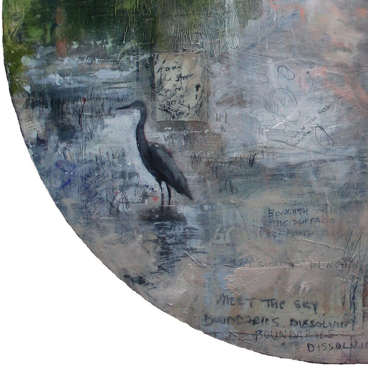 Toni Cogdell’s circular mixed media painting titled The River features a soft, partially obscured female portrait emerging from a wash of pale greys, blues, and greens. Surrounded by subtle architectural sketches, abstract textures, handwritten fragments, and a solitary heron, the piece evokes memory and landscape as one. The composition drifts fluidly between figuration and abstraction, layered with acrylic, spray paint, collage, and oil on wood panel.