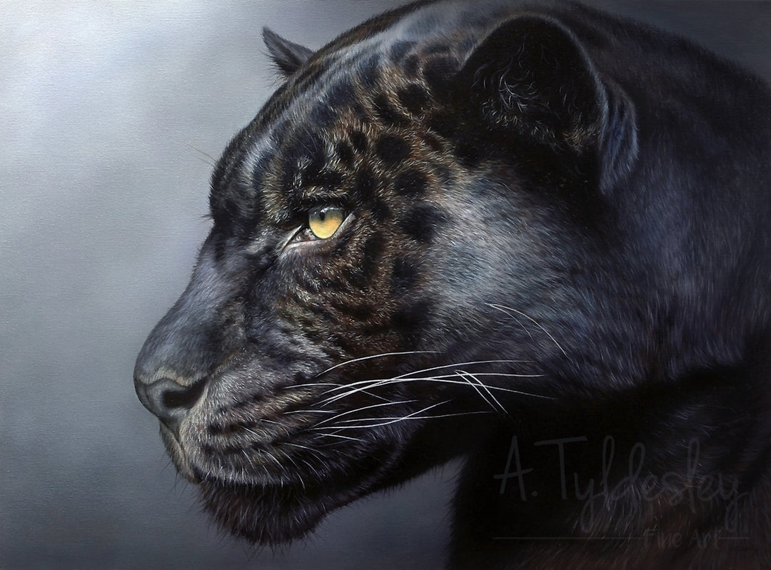 Side profile of a black panther with golden-yellow eyes and faint rosette markings against a soft grey background.