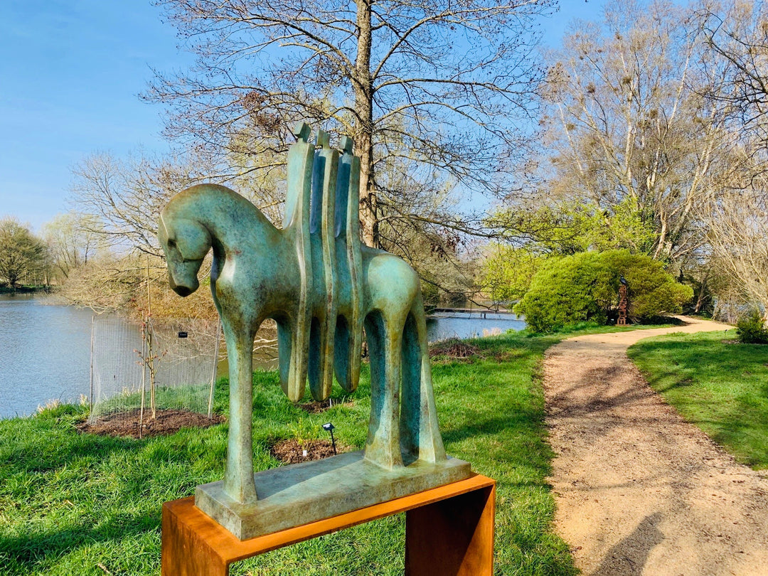 Marie Ackers The Three Riders bronze horse sculpture with abstracted equestrian forms and three stylised riders. Available in grey or verdigris patina, limited edition, suitable for indoor or outdoor display, signed and foundry stamped.