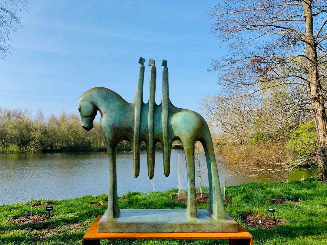 Marie Ackers The Three Riders bronze horse sculpture with abstracted equestrian forms and three stylised riders. Available in grey or verdigris patina, limited edition, suitable for indoor or outdoor display, signed and foundry stamped.