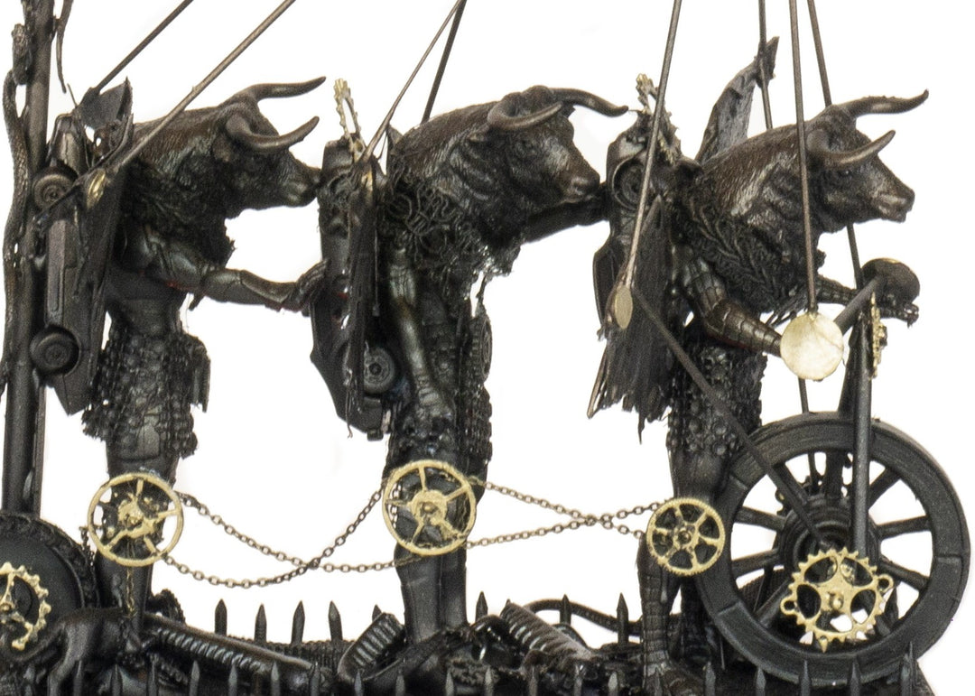 “Three Minotaurs on Their Way to a Dance” by Andrew Stevens – a one-off steampunk sculpture crafted from recycled metal and found objects, featuring three hybrid Minotaur figures with mechanical wings and gears, finished in dark bronze patina.