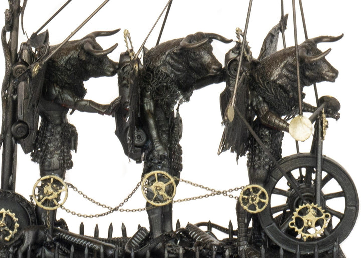 “Three Minotaurs on Their Way to a Dance” by Andrew Stevens – a one-off steampunk sculpture crafted from recycled metal and found objects, featuring three hybrid Minotaur figures with mechanical wings and gears, finished in dark bronze patina.