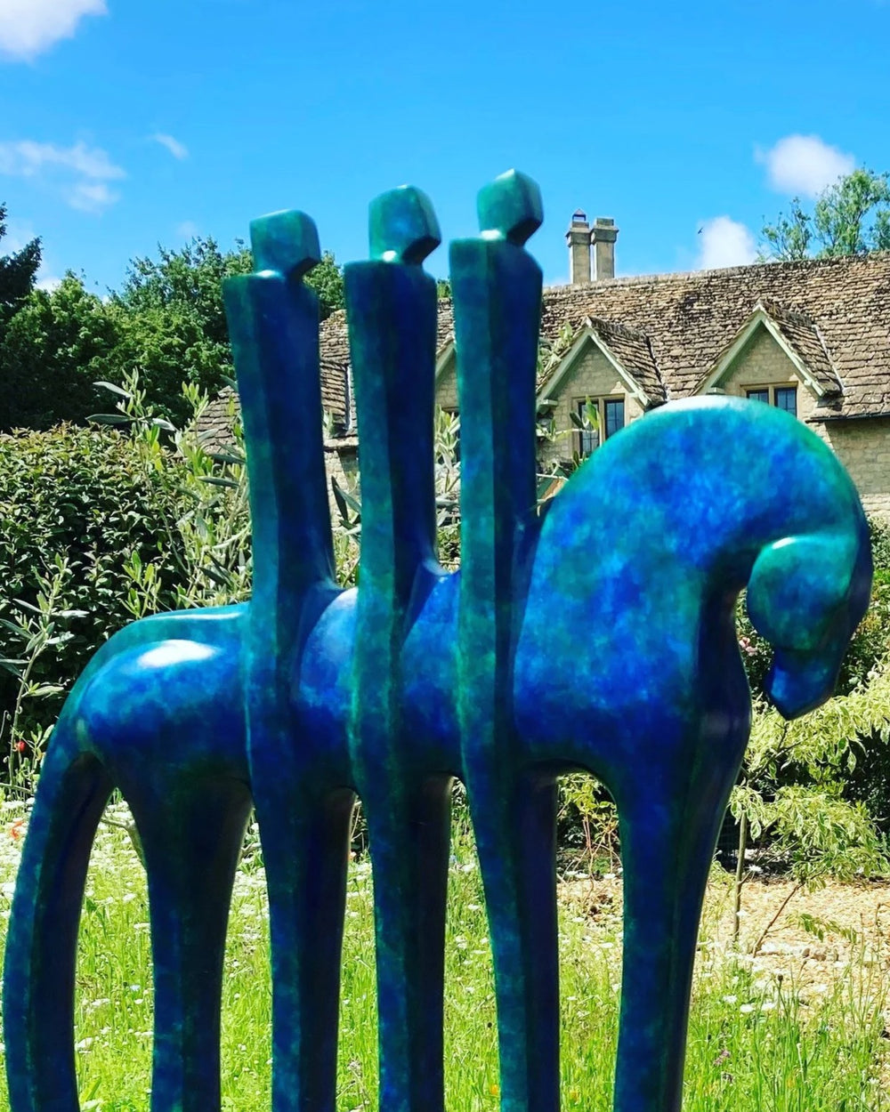 Marie Ackers Trojan bronze horse sculpture, limited edition of 8. Stylised equestrian form with three upright riders, finished in vibrant blue patina. Signed, numbered, and foundry stamped, suitable for indoor or outdoor display.