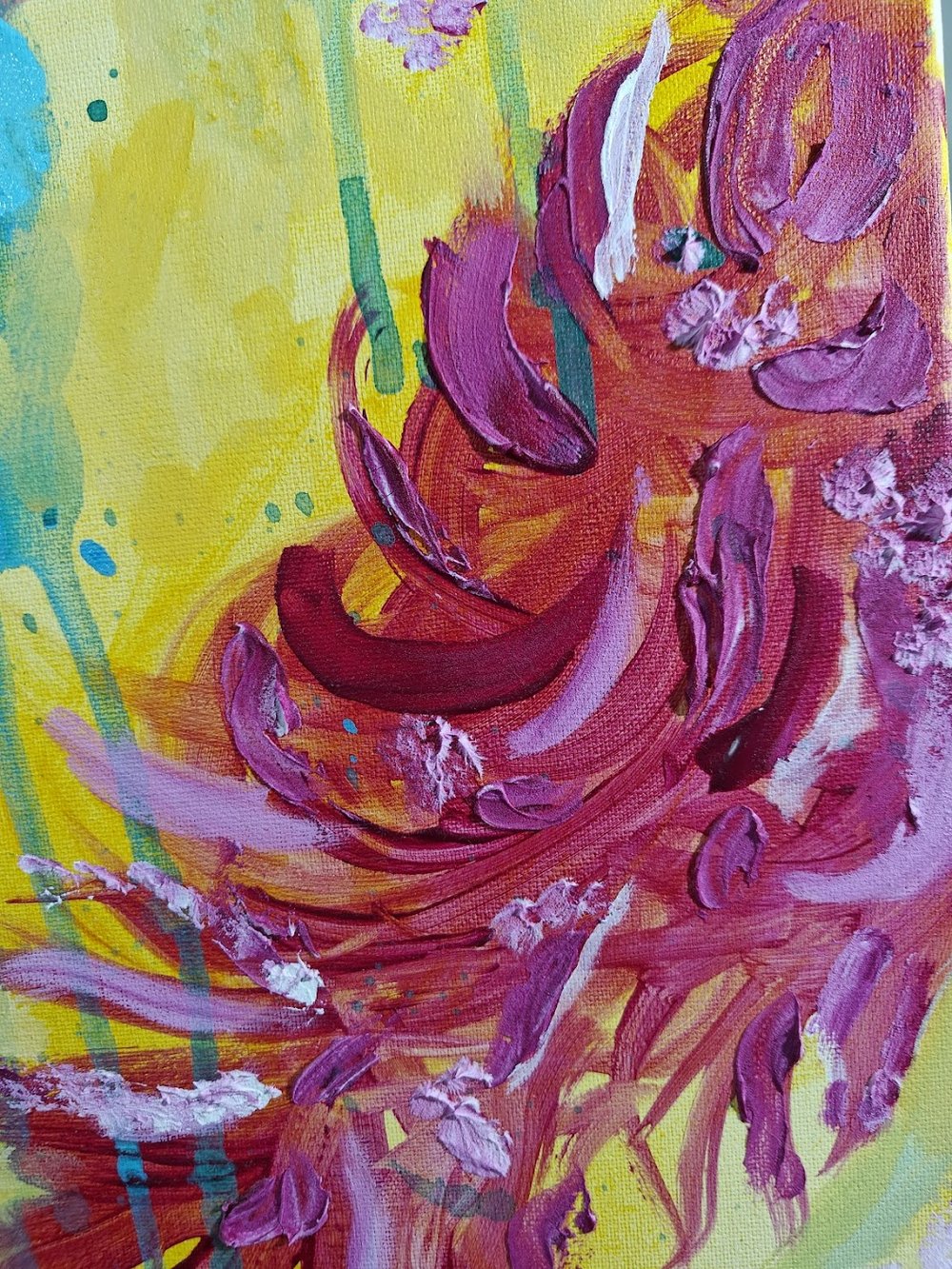 Vivid abstract painting with bold magenta florals, dripping green strokes, and splashes of blue over a bright yellow background