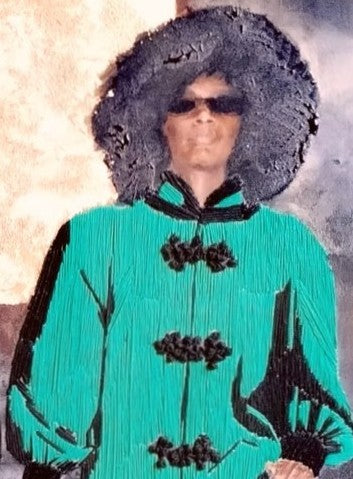 Hyperreal textile and acrylic artwork Genetic Factors by Helena Safari, depicting two identical figures holding hands, wearing embroidered green coats with black trim, afros, and sunglasses, blending embroidery texture with paint on canvas.