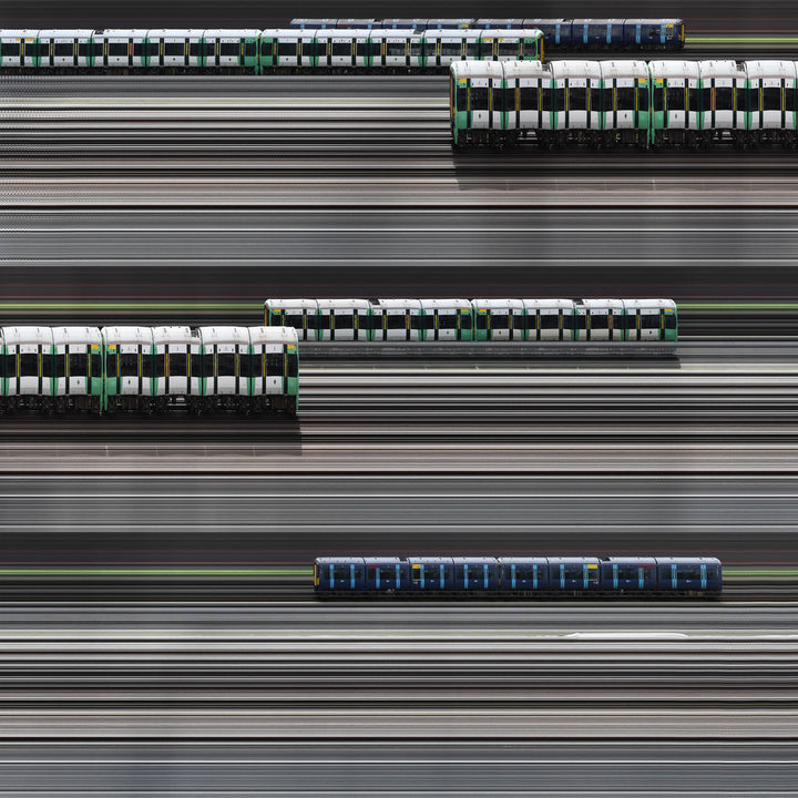Richard P Jones Victoria Junction, London fine art photographic print showing layered London Underground and rail trains moving through a junction of tracks, created from reconstructed high-speed video imagery and printed as a giclée on brushed aluminium.