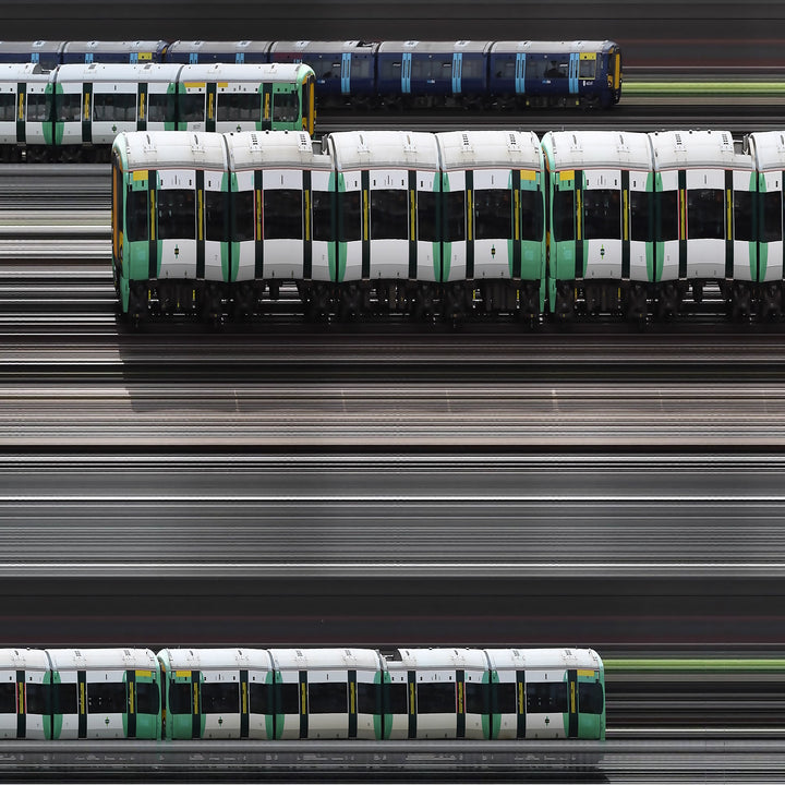 Richard P Jones Victoria Junction, London fine art photographic print showing layered London Underground and rail trains moving through a junction of tracks, created from reconstructed high-speed video imagery and printed as a giclée on brushed aluminium.