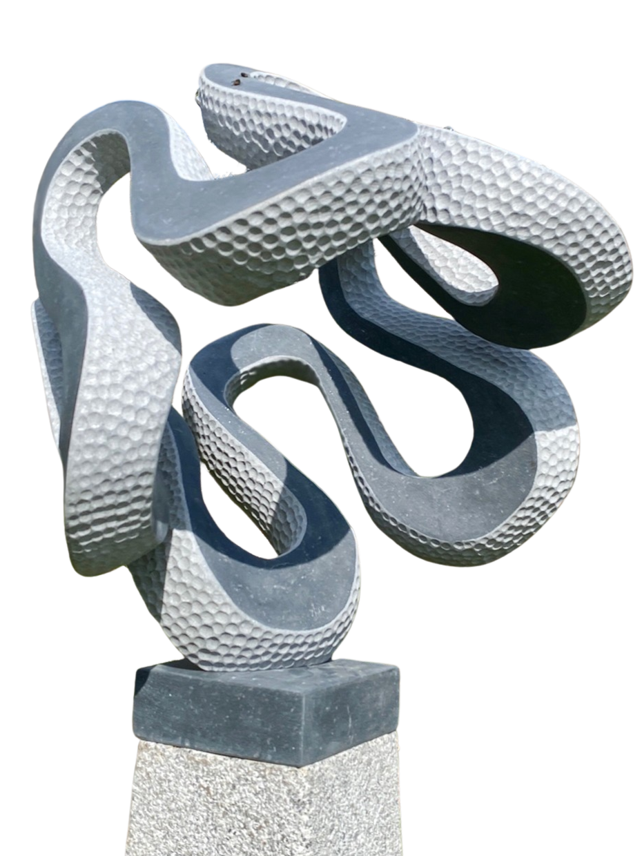 Abstract stone sculpture Wiggle – 2025 by Hamish Holman, carved in dark grey Kilkenny limestone with an interwoven looping form, combining smooth flowing curves with textured hand-carved dimples, dynamic and playful, mounted on a stone plinth.