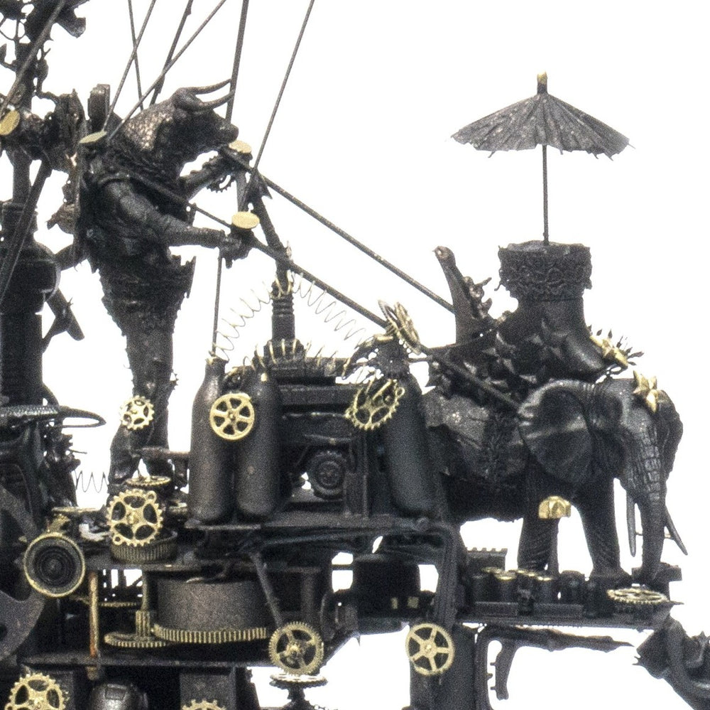 “Winged Minotaur VI” by Andrew Stevens – a steampunk-inspired one-off sculpture crafted from recycled materials, featuring gears, propellers, and hybrid figures. A surreal fusion of myth and machine with a dark bronze patina finish.