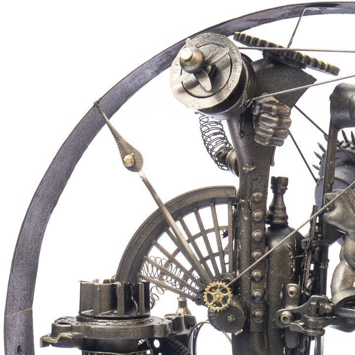 “Winged Minotaur XVII” by Andrew Stevens – a one-off steampunk sculpture crafted from recycled gears, engine parts and found objects. Blending myth and machinery, the piece features bronze patina tones and intricate mechanical detailing.