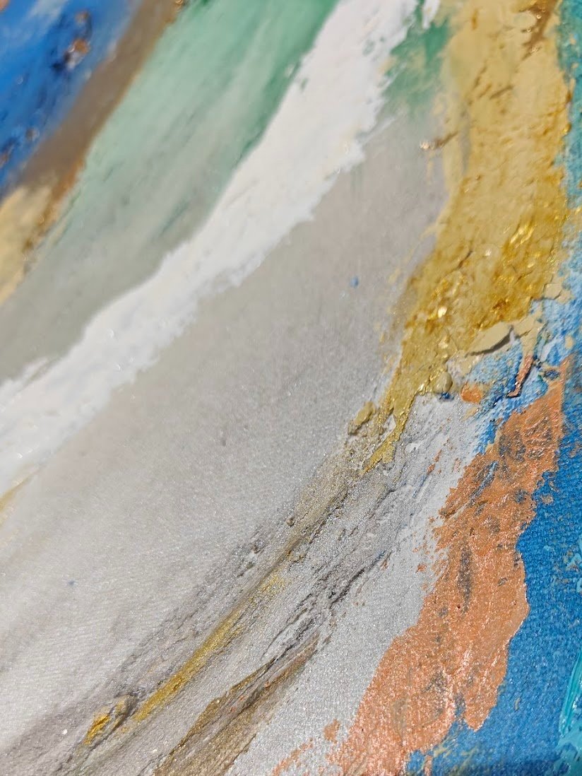Vibrant abstract painting with swirling strokes of blue, green, white, and gold, evoking the motion of water and natural elements