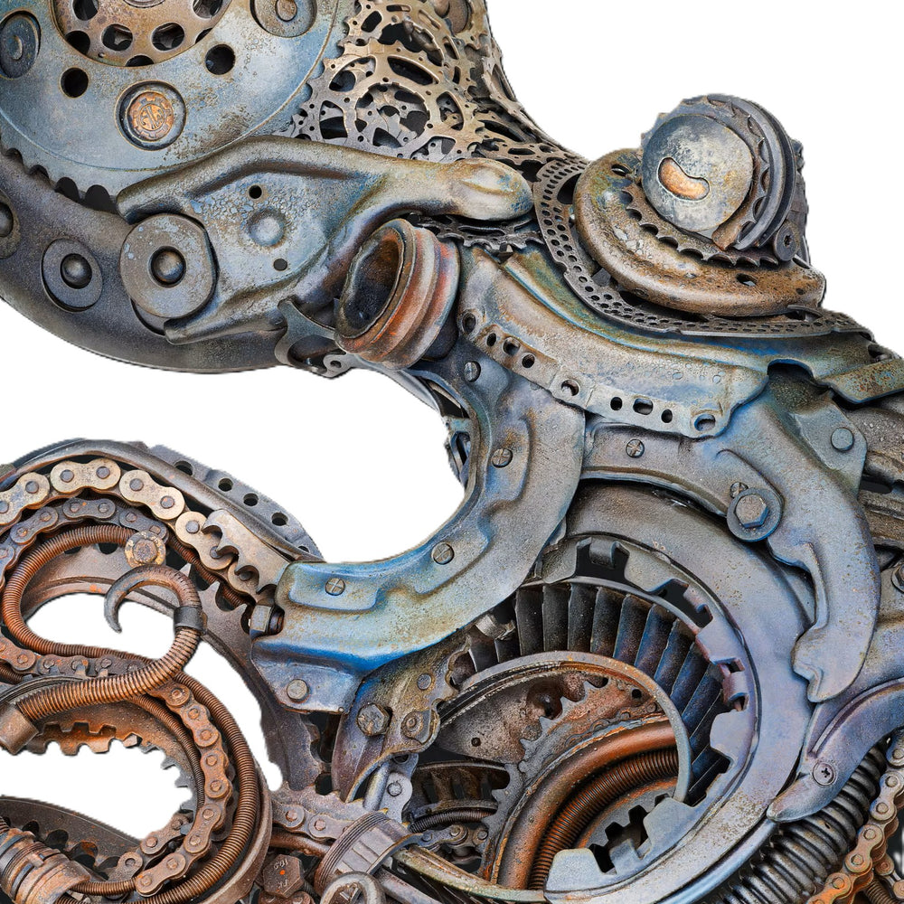 Intricate octopus sculpture crafted from reclaimed metal and gears, blending steampunk style with marine form.