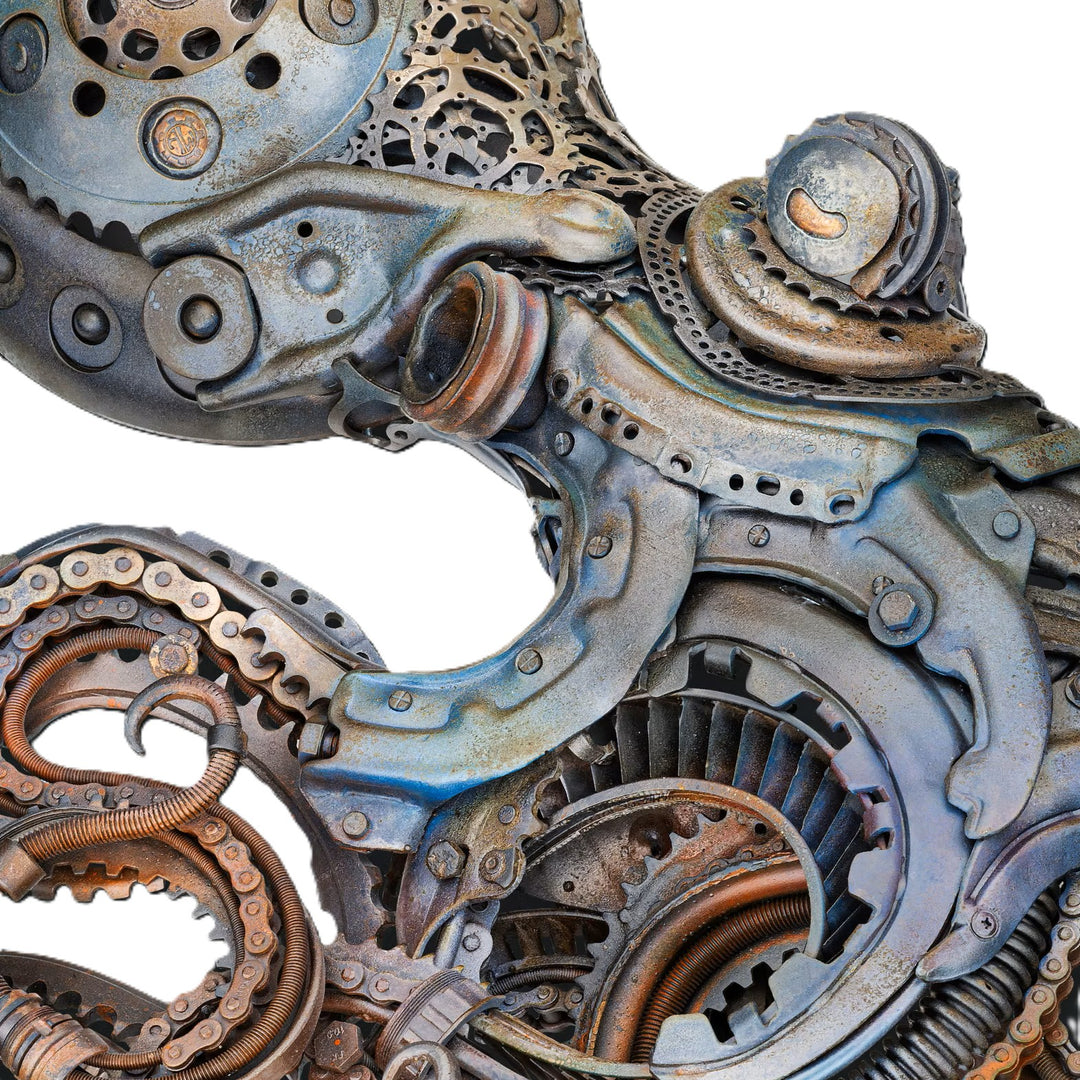 Intricate octopus sculpture crafted from reclaimed metal and gears, blending steampunk style with marine form.