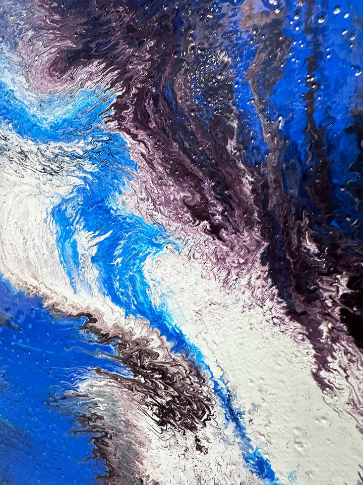 Large abstract painting “Atomic Butterfly” by Swarez — dramatic centrifugal spin art with explosive bursts of cobalt blue, electric turquoise, deep violet purple, crisp white, and black radiating from the centre across a heavily textured enamel surface.