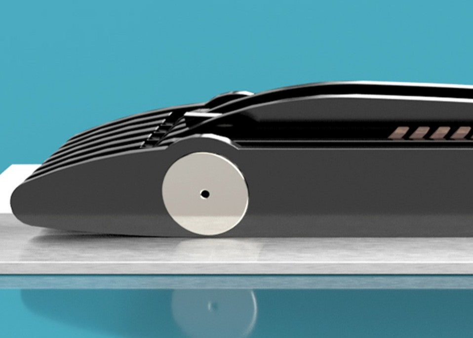 Limited-edition Bluebird V 1935 sculpture by Jonny Ambrose — layered black polished acrylic body with walnut tail-fin and polished nickel-plated aluminium details on a sleek white acrylic or brushed aluminium plinth, celebrating Malcolm Campbell’s 1935 land speed record at Bonneville Salt Flats.