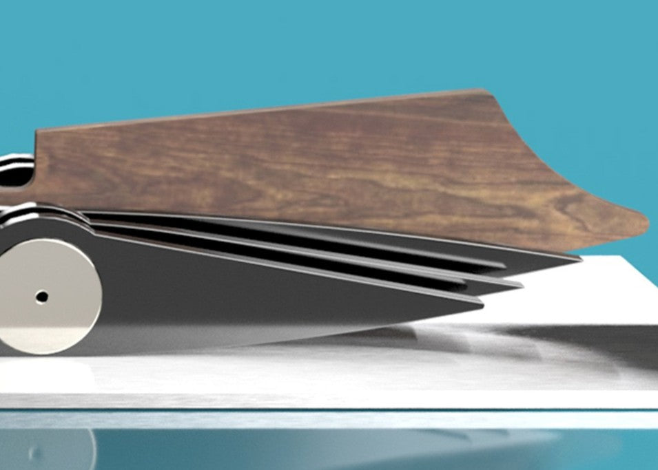 Limited-edition Bluebird V 1935 sculpture by Jonny Ambrose — layered black polished acrylic body with walnut tail-fin and polished nickel-plated aluminium details on a sleek white acrylic or brushed aluminium plinth, celebrating Malcolm Campbell’s 1935 land speed record at Bonneville Salt Flats.