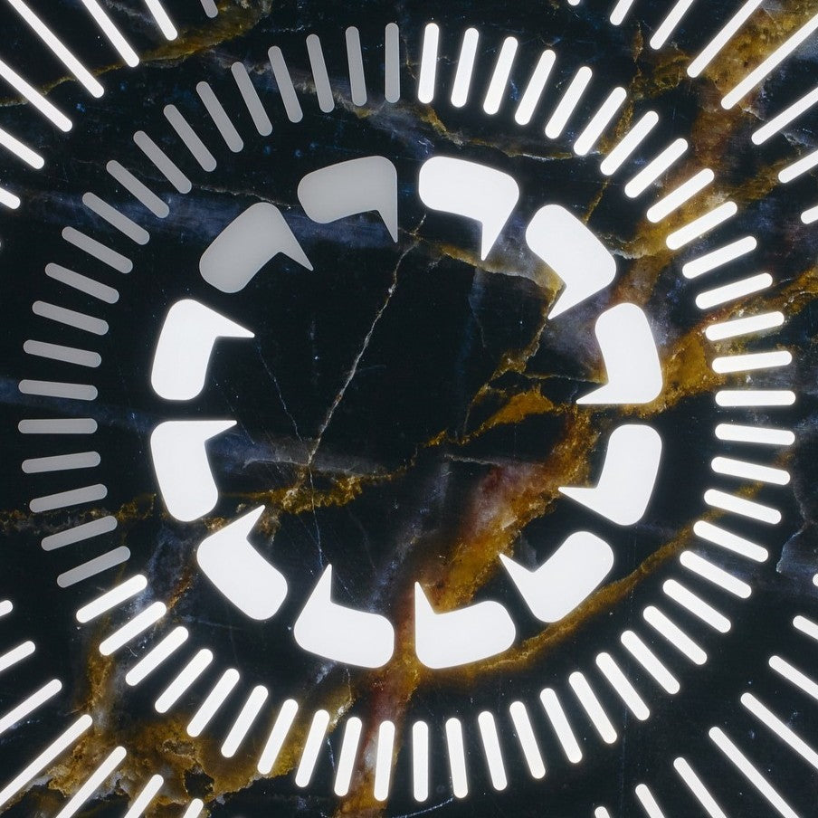 “Tempus Emperor” by Ben Rousseau – a limited-edition illuminated wall timepiece crafted from black and gold marbled glass with brass-tinted aluminium and LEDs. A regal fusion of design, light, and luxury craftsmanship.

