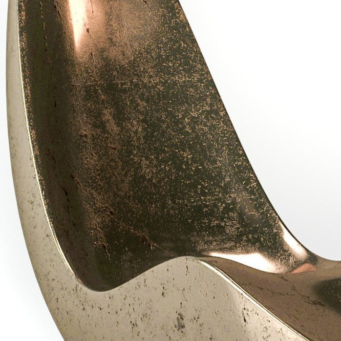 “Caillou Chaise – Liquid Metal” by Ben Rousseau – a sculptural chaise finished in molten bronze-effect liquid metal, hand-shaped in composite. A sleek fusion of art, engineering, and contemporary design that transforms seating into sculpture.