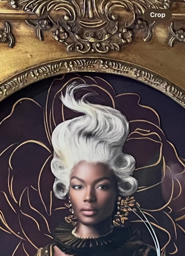 Catarina Diaz’s Between Two Worlds, analogue collage with Somerset Enhanced Velvet and oil on canvas board. Regal Black woman with flowing white hair, fox in her lap, small bird on shoulder, set against deep burgundy floral backdrop in ornate antique frame.
