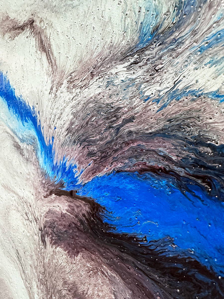 Large abstract painting “Atomic Butterfly” by Swarez — dramatic centrifugal spin art with explosive bursts of cobalt blue, electric turquoise, deep violet purple, crisp white, and black radiating from the centre across a heavily textured enamel surface.